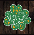 happy saint patricks day label on wooden board vector image vector image