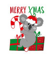 merry xmas - cute koala bear in santa hat vector image