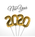 new year 2020 celebration with gold foil balloons vector image