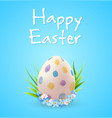 easter egg and blue spring flowers vector image vector image