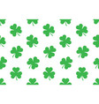 seamless pattern with shamrocks vector image