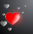 red glowing heart in the midst of gray hearts vector image