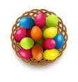 easter eggs with wicker basket vector image vector image