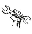 hand holding a wrench tools icon cartoon vector image