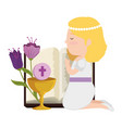 little kneeling girl with bible and flowers first vector image