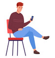 waiting guy sit in chair and looking at smartphone vector image