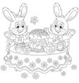 bunnies with an easter cake vector image