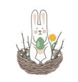 cute easter bunny holding egg in his paws vector image vector image