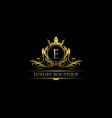 luxury royal king e letter crest gold logo vector image