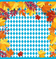 autumn leaves on a background pattern of blue vector image