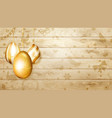 hanging golden easter eggs vector image